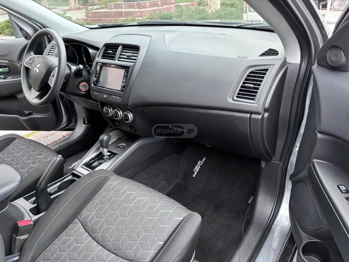 Mitsubishi Outlander Sport - фото 11