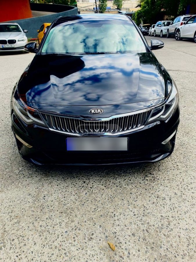 Kia Optima - фото 1