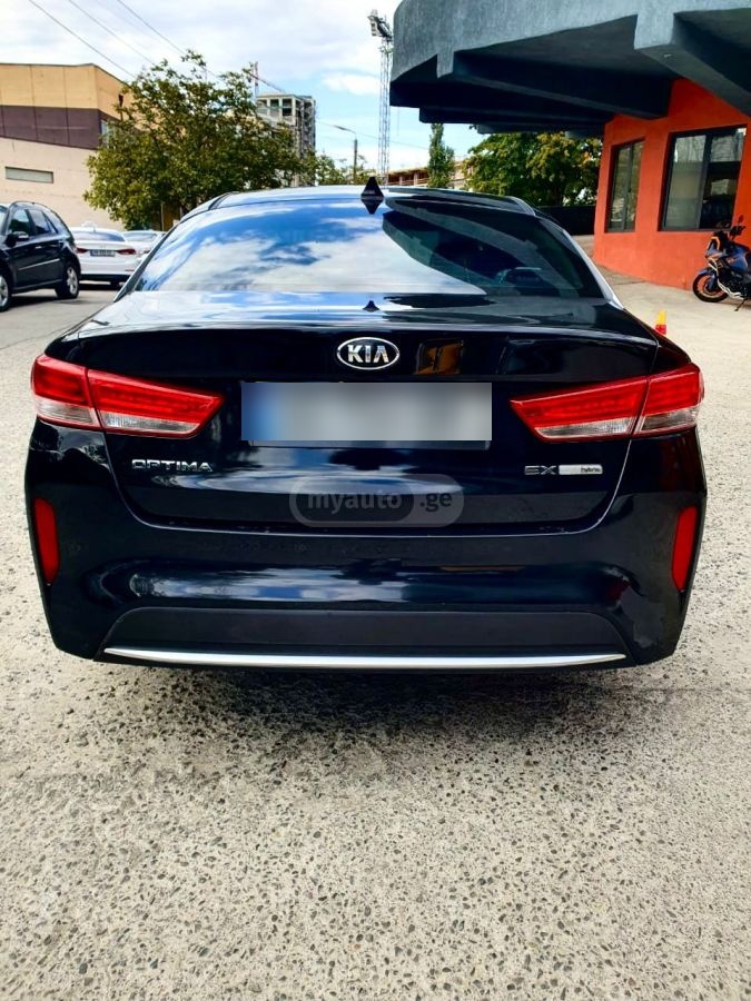 Kia Optima - фото 5