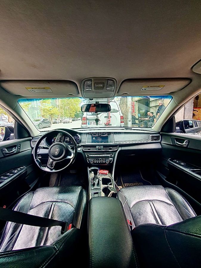 Kia Optima - фото 7