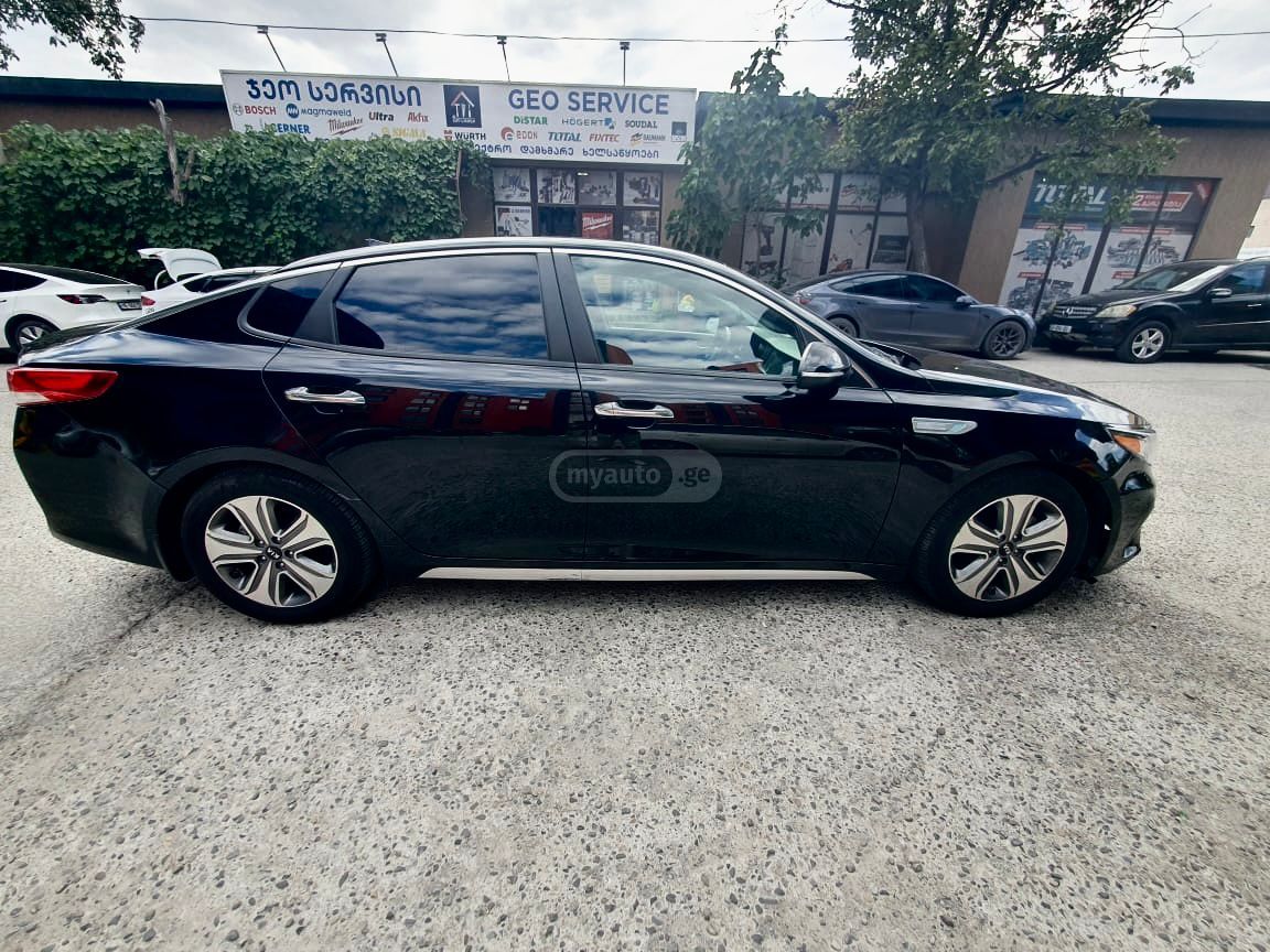 Kia Optima - фото 8