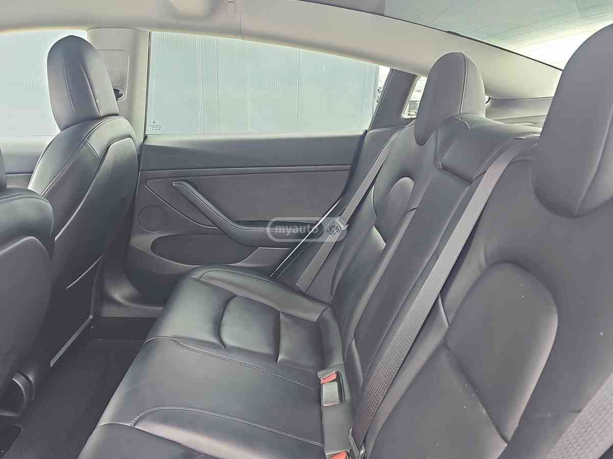 Tesla Model 3 - фото 10