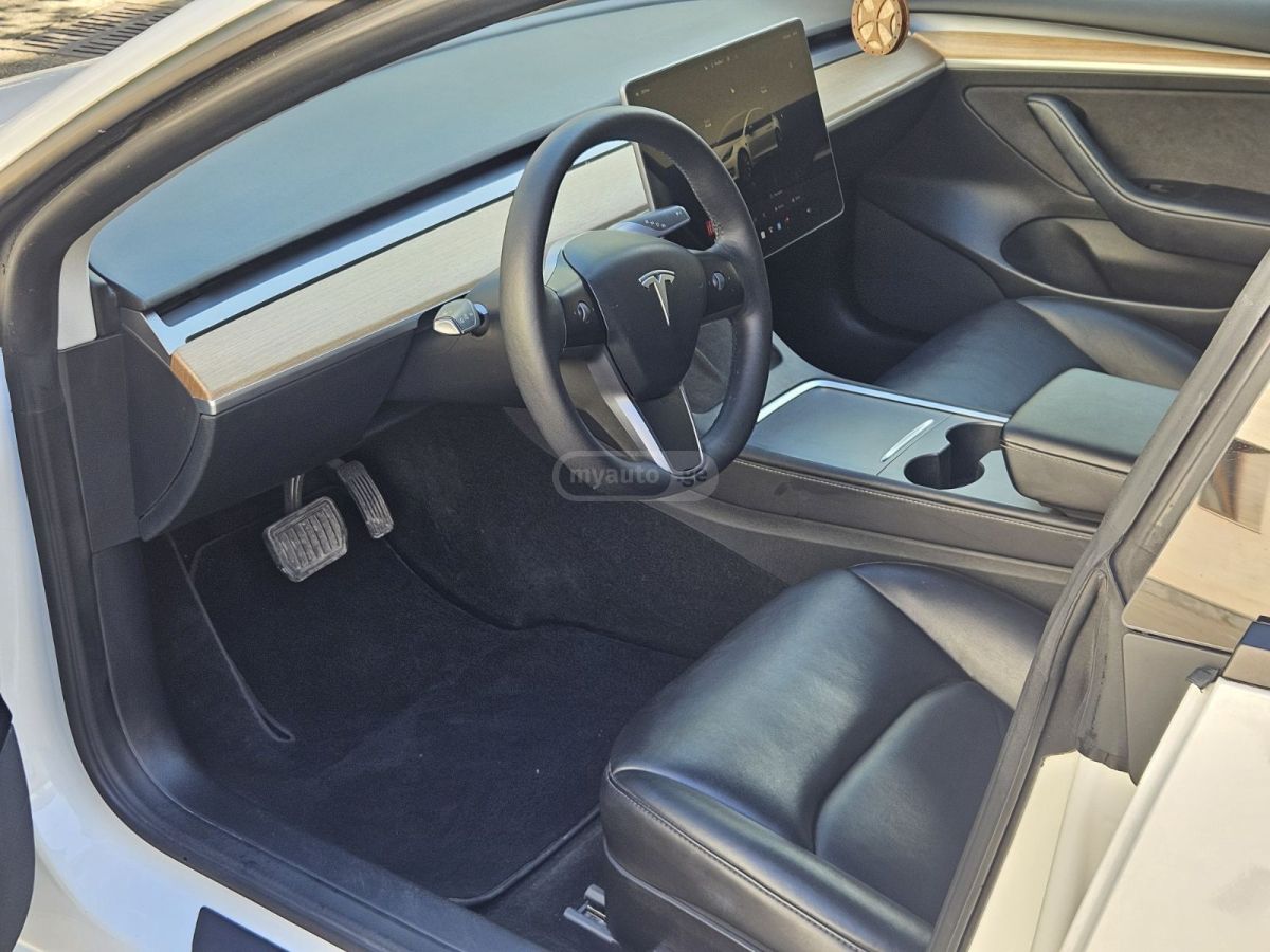 Tesla Model 3 - фото 4