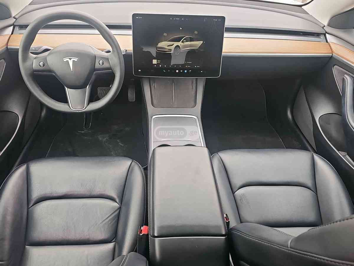 Tesla Model 3 - фото 8