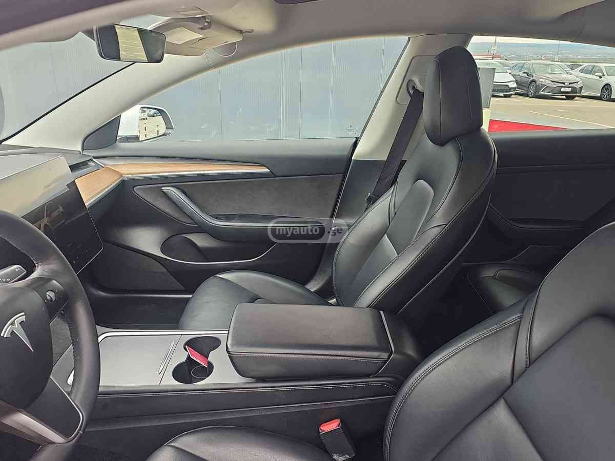 Tesla Model 3 - фото 9