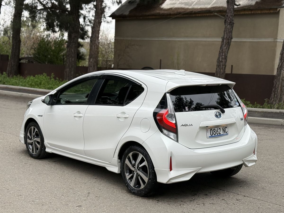 Toyota Aqua - фото 5