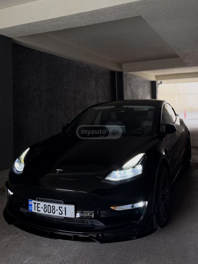 Tesla Model 3 - фото 10