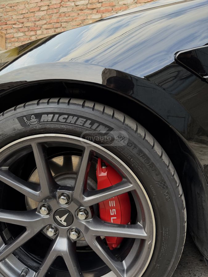 Tesla Model 3 - фото 12