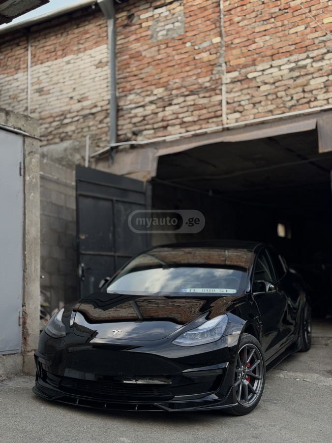 Tesla Model 3 - фото 7