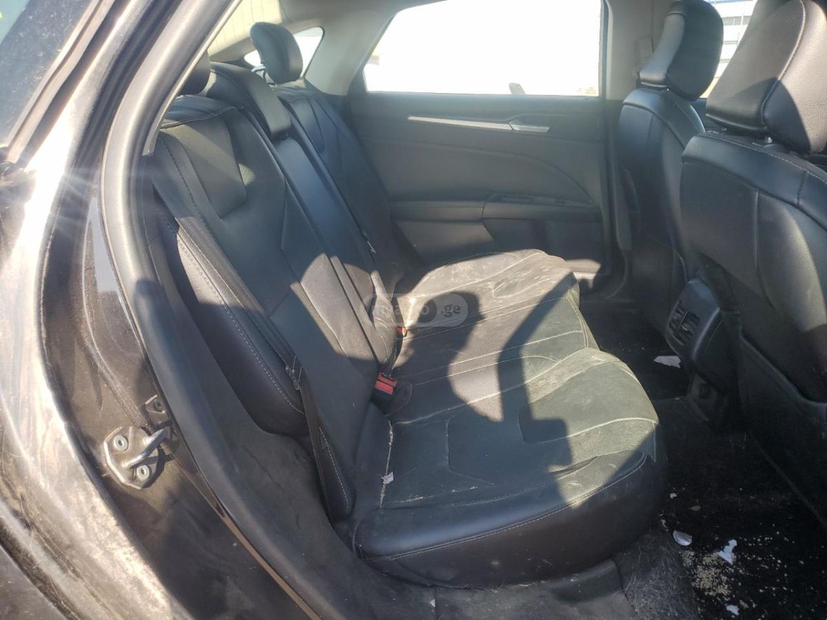 Ford Fusion - фото 10