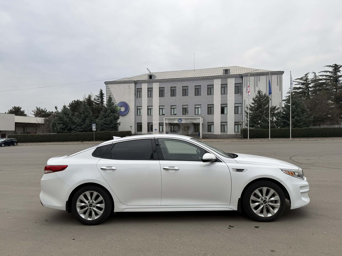Kia Optima - фото 11