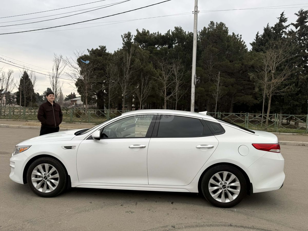 Kia Optima - фото 12