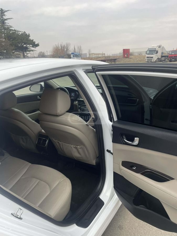 Kia Optima - фото 6