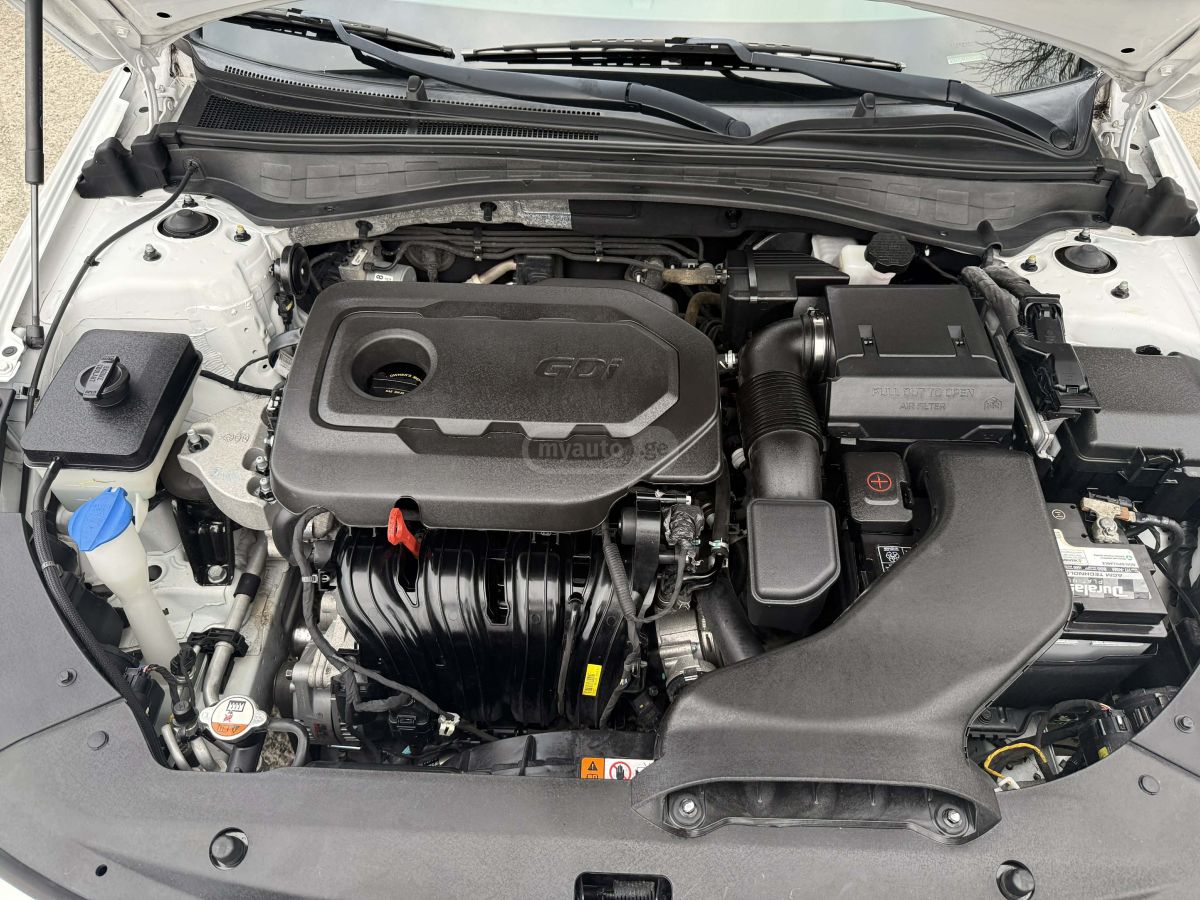 Kia Optima - фото 7