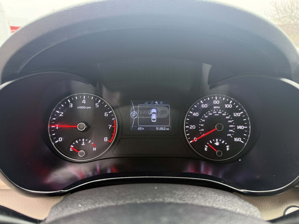 Kia Optima - фото 8