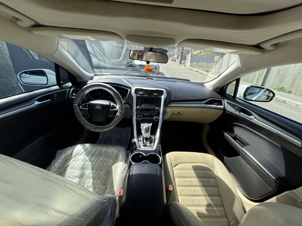 Ford Fusion - фото 11