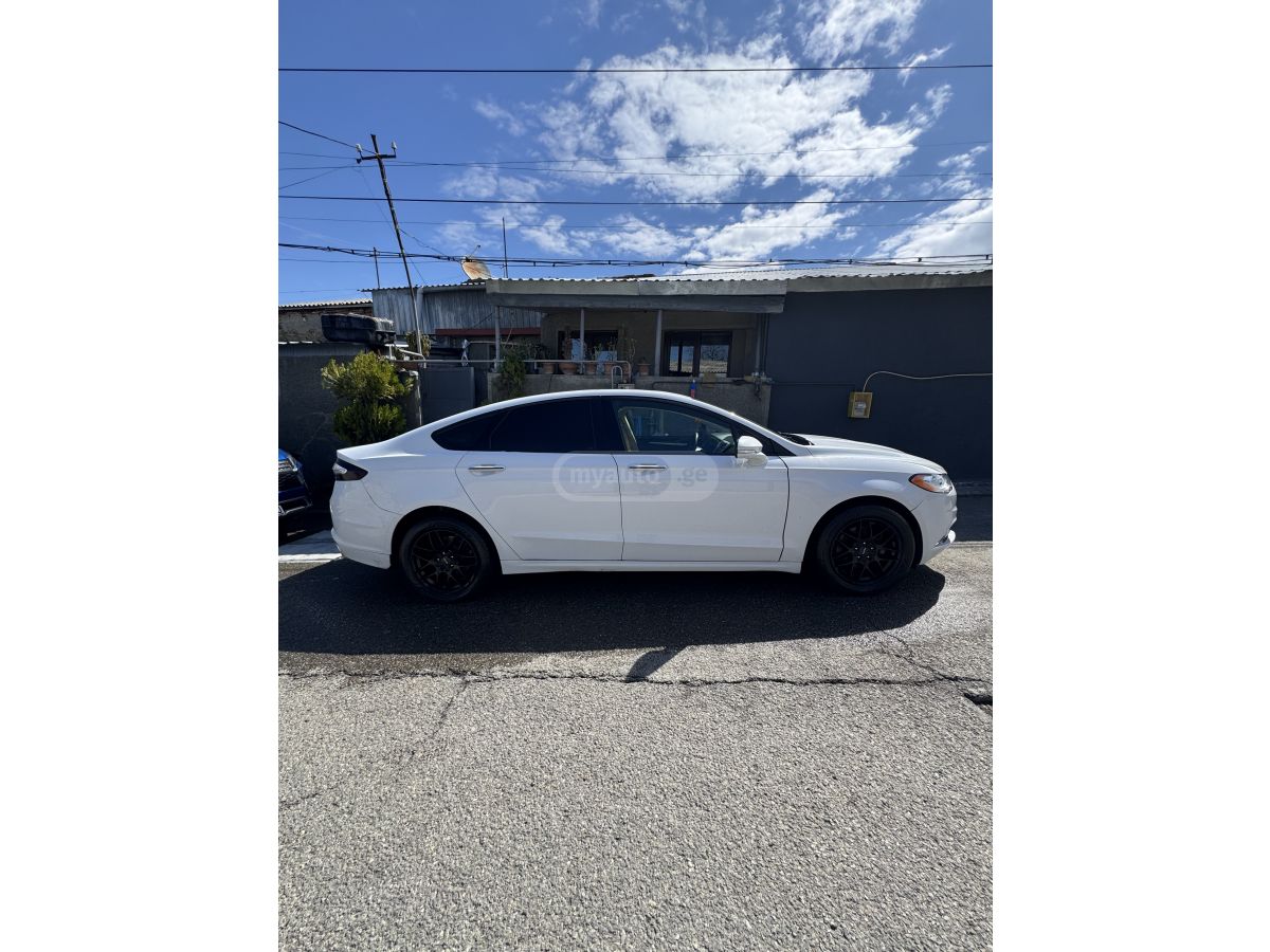 Ford Fusion - фото 3