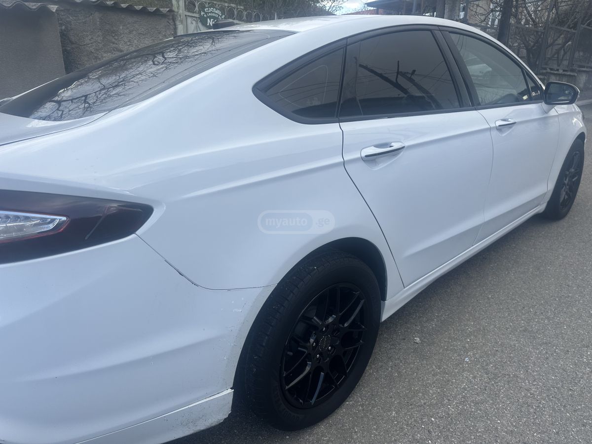 Ford Fusion - фото 7