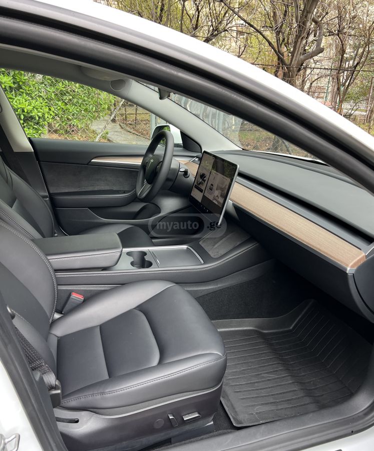 Tesla Model 3 - фото 10