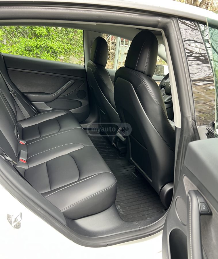 Tesla Model 3 - фото 12