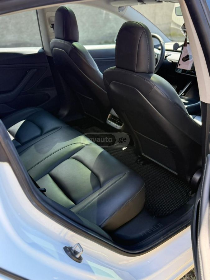 Tesla Model 3 - фото 10