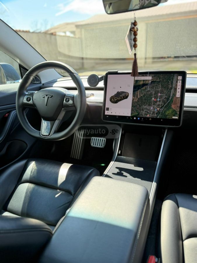 Tesla Model 3 - фото 14