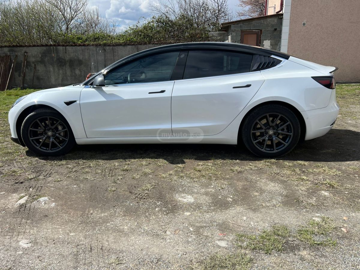 Tesla Model 3 - фото 5