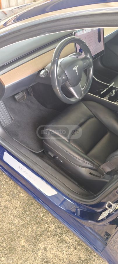 Tesla Model 3 - фото 9