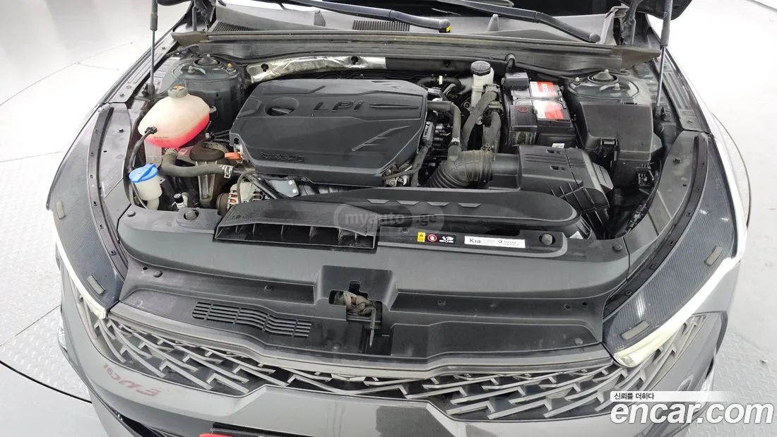 Kia Optima - фото 6