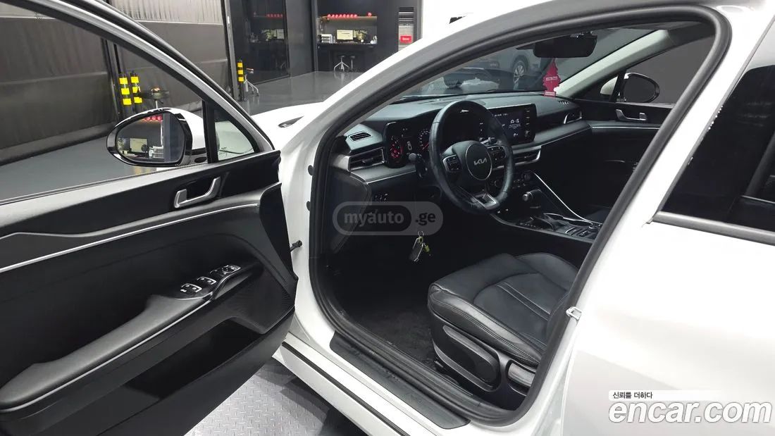 Kia Optima - фото 10