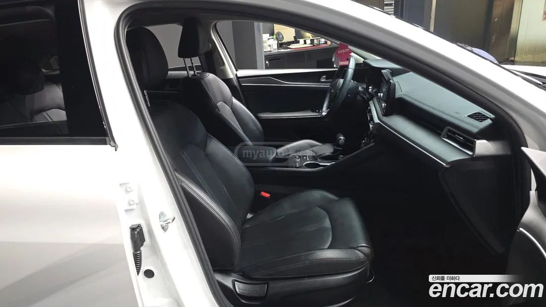 Kia Optima - фото 11