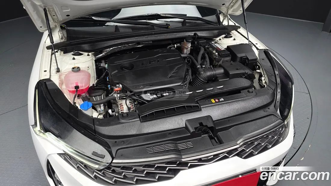 Kia Optima - фото 6