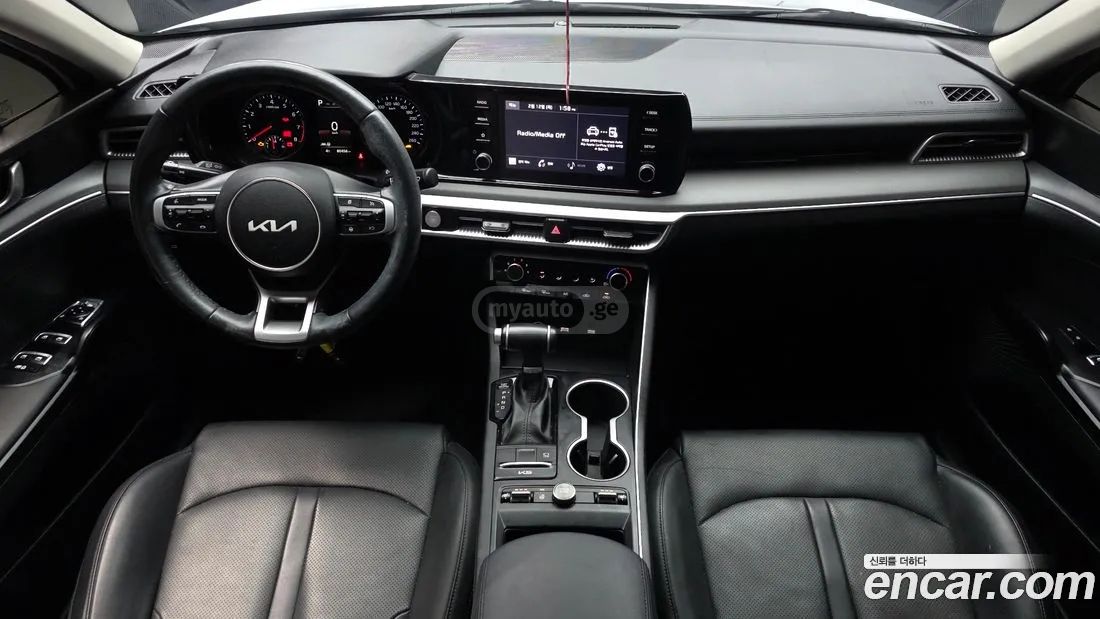 Kia Optima - фото 7