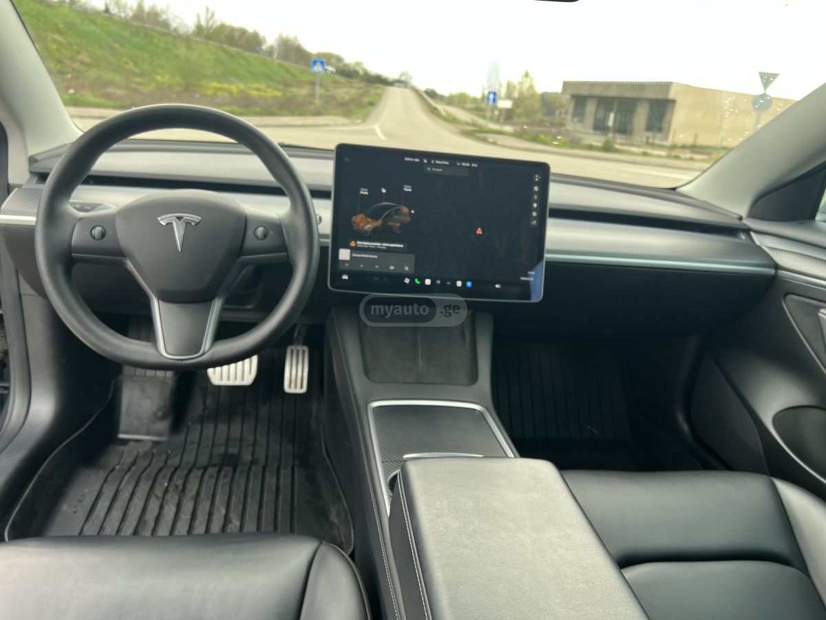 Tesla Model 3 - фото 10