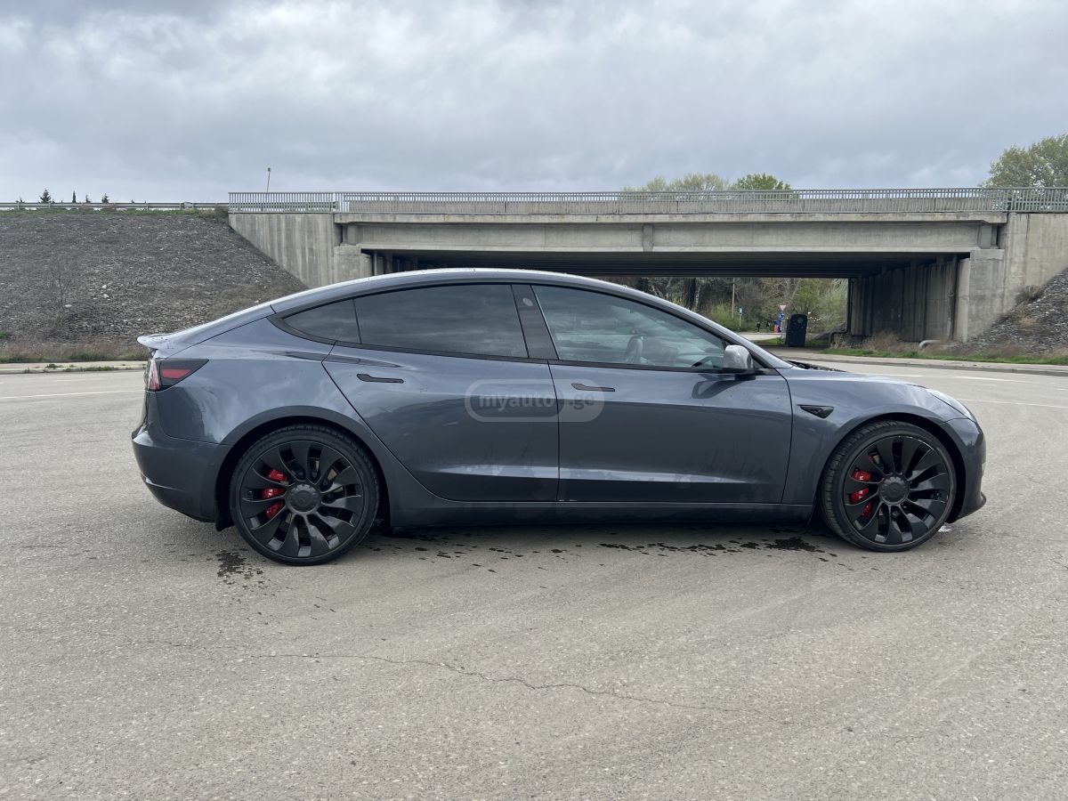 Tesla Model 3 - фото 7