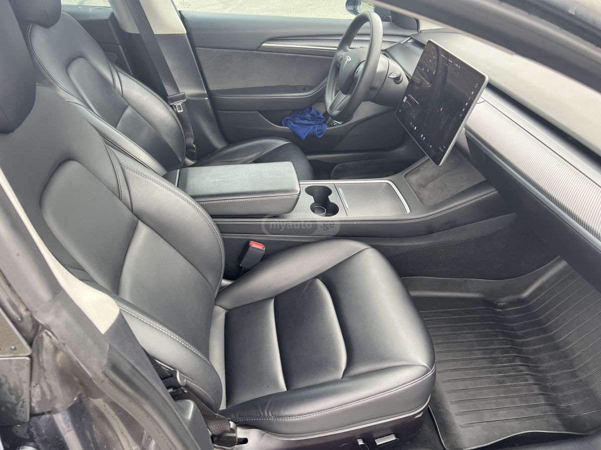 Tesla Model 3 - фото 8