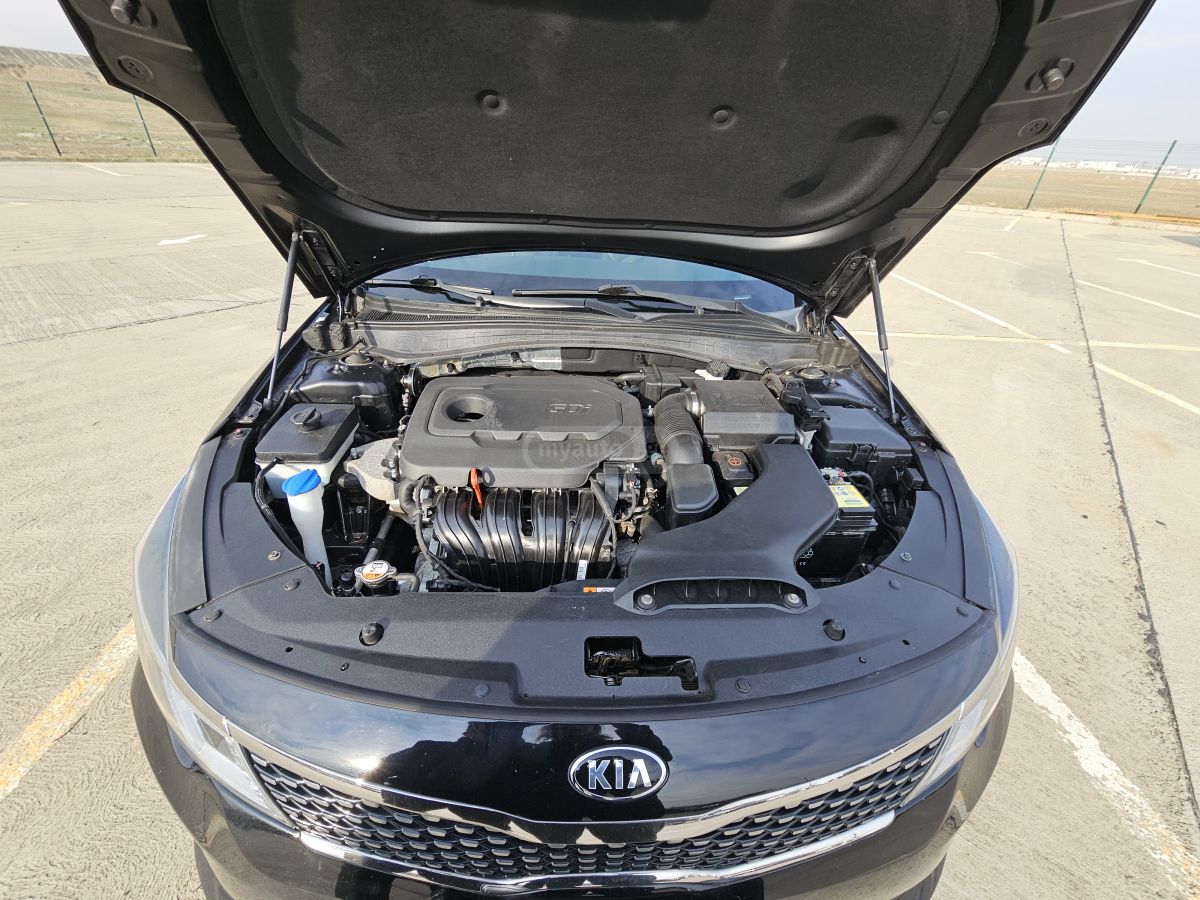 Kia Optima - фото 11