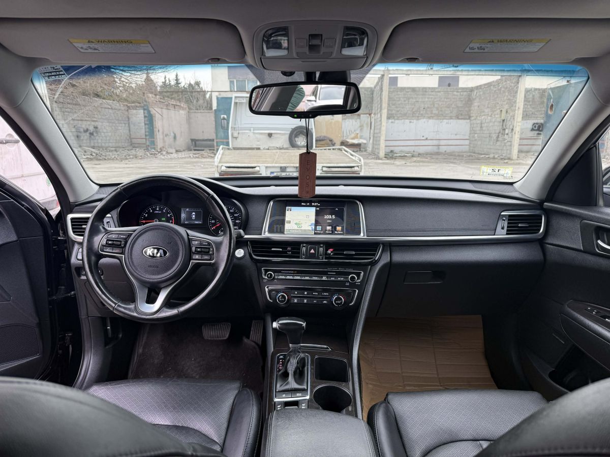 Kia Optima - фото 12