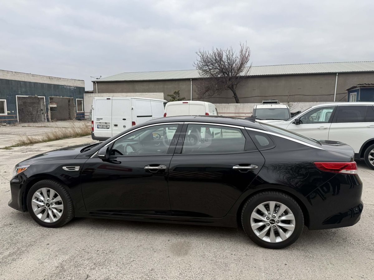 Kia Optima - фото 6