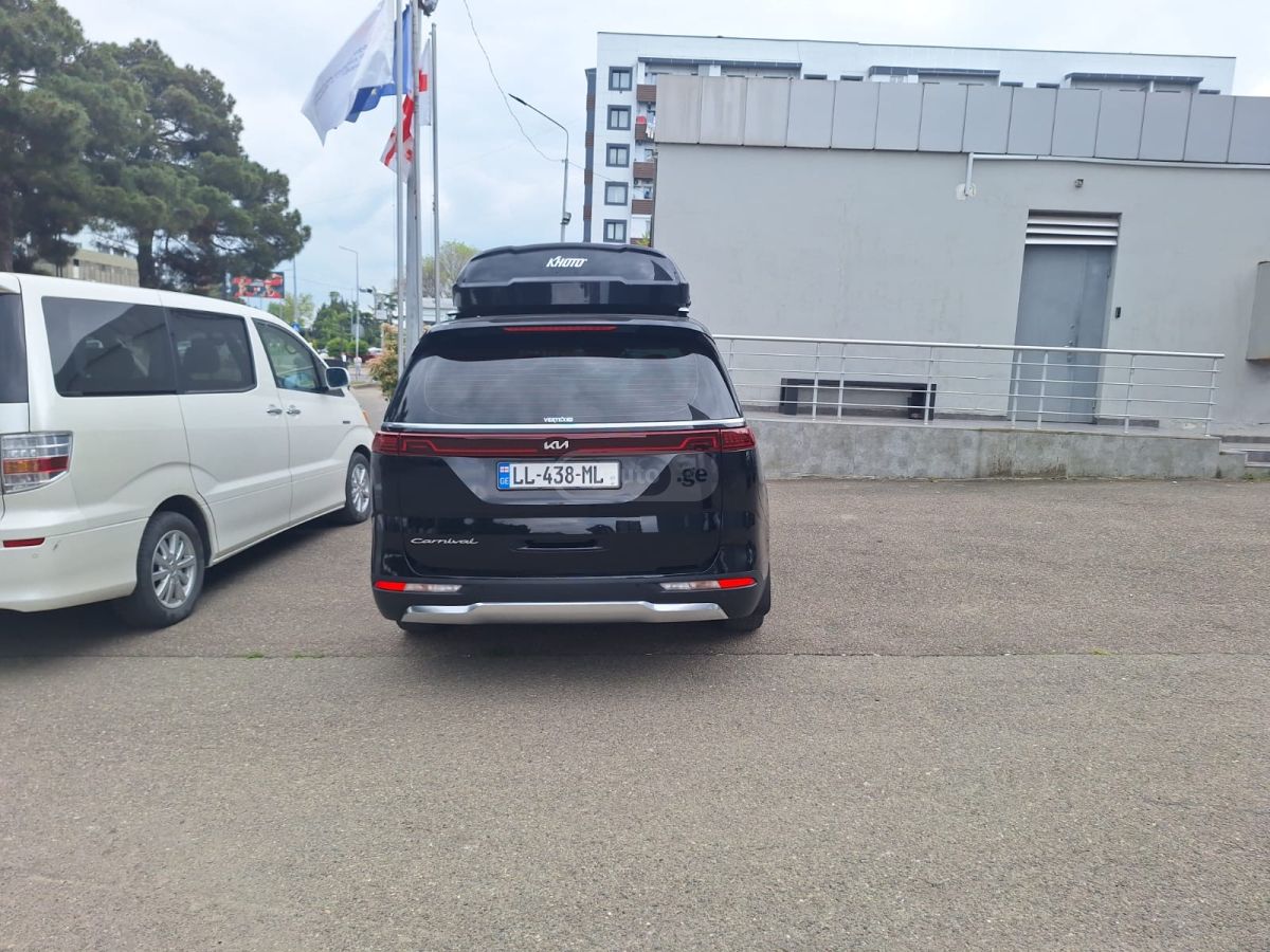 Kia Carnival - фото 6