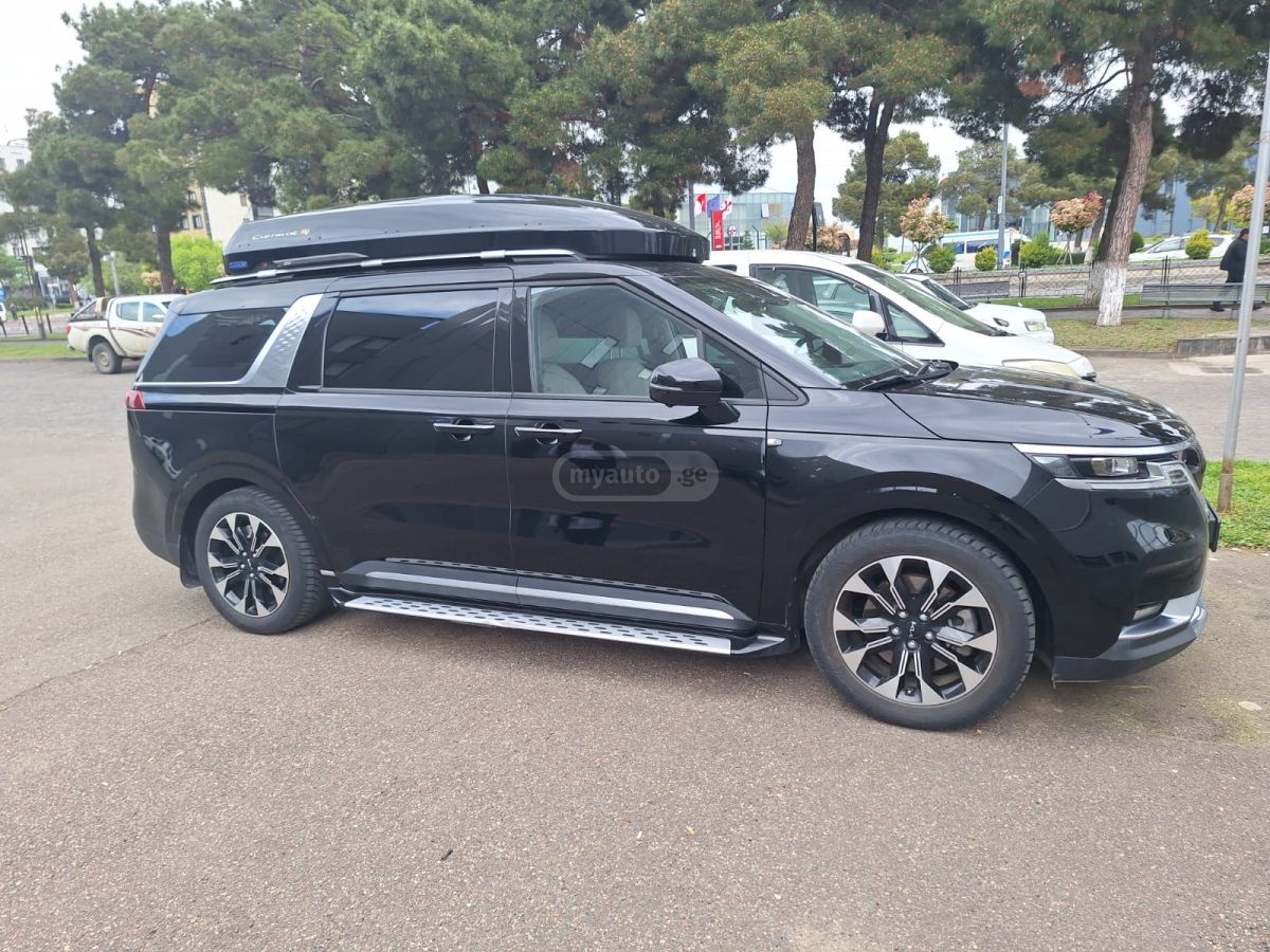 Kia Carnival - фото 7