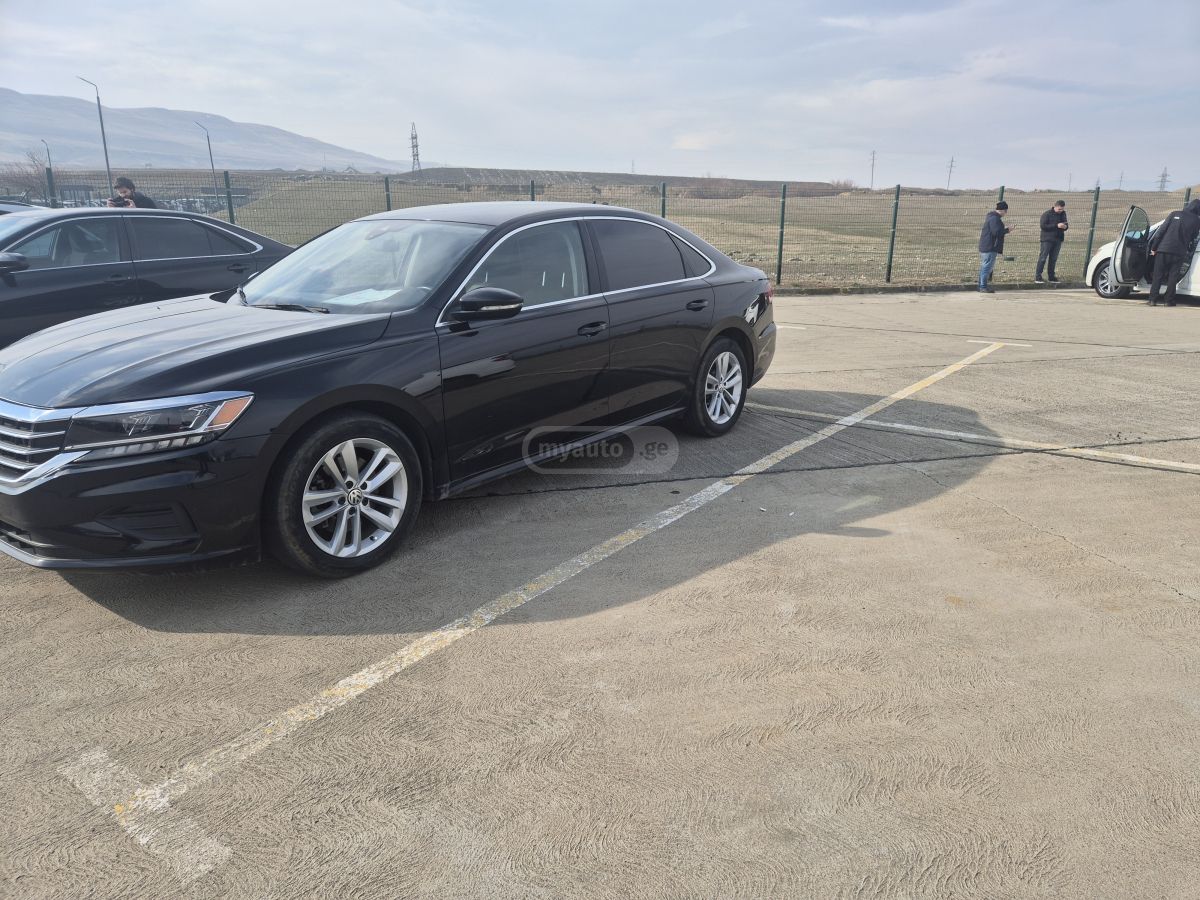 Volkswagen Passat - фото 2