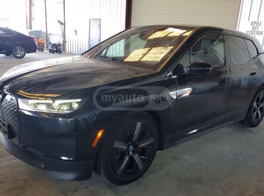 BMW iX - фото 1