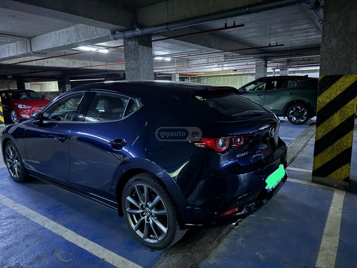 Mazda Mazda 3 - фото 2