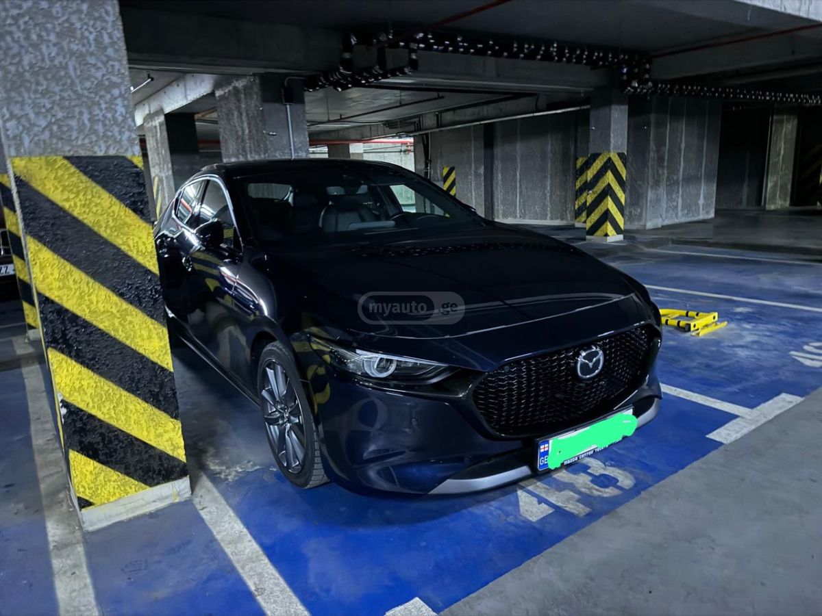 Mazda Mazda 3 - фото 3