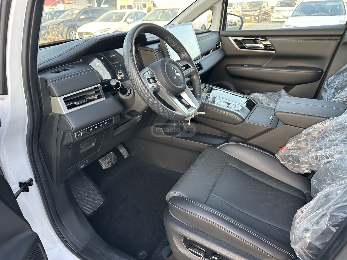 Mitsubishi Airtrek - фото 15