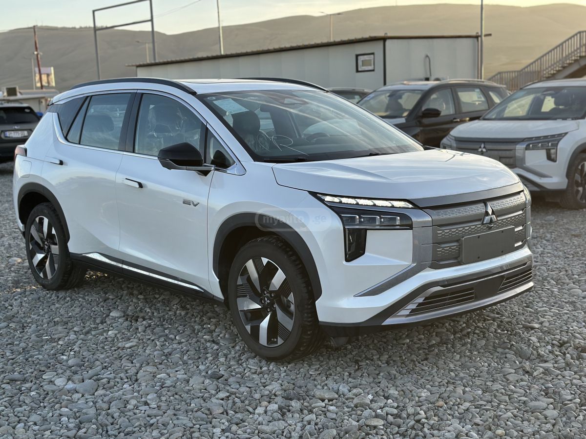 Mitsubishi Airtrek - фото 6