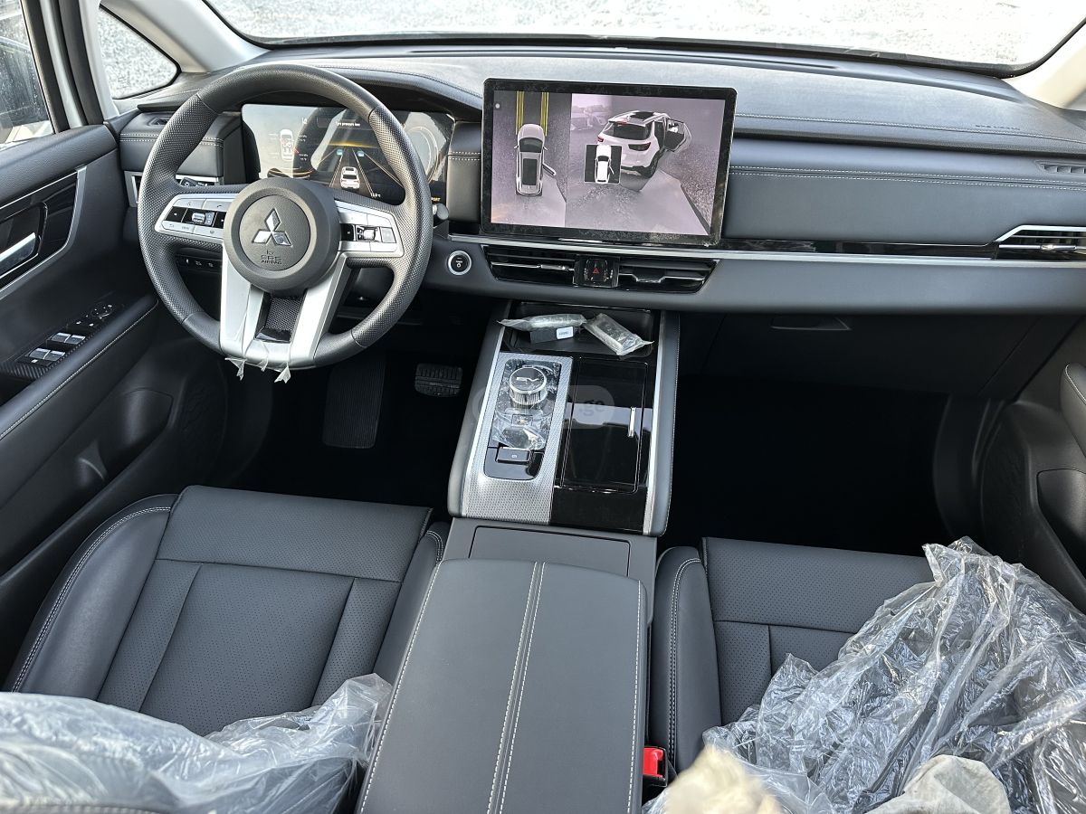 Mitsubishi Airtrek - фото 8