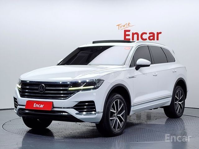 Volkswagen Touareg - фото 1
