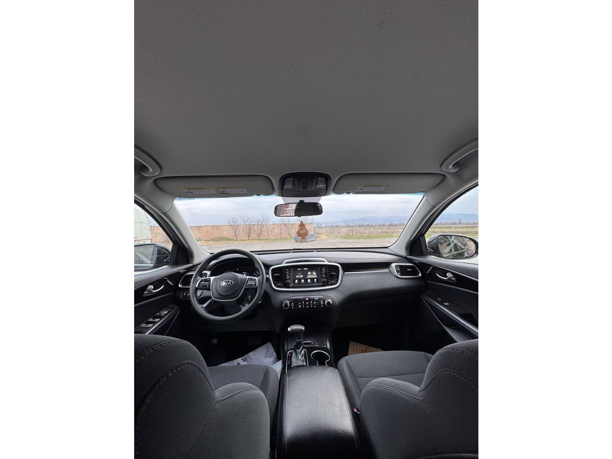 Kia Sorento - фото 10